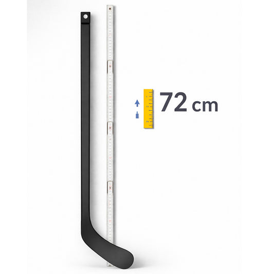 Black ABSHockey mini hockey stick next to a folding ruler with 72 cm length indicator on a light background