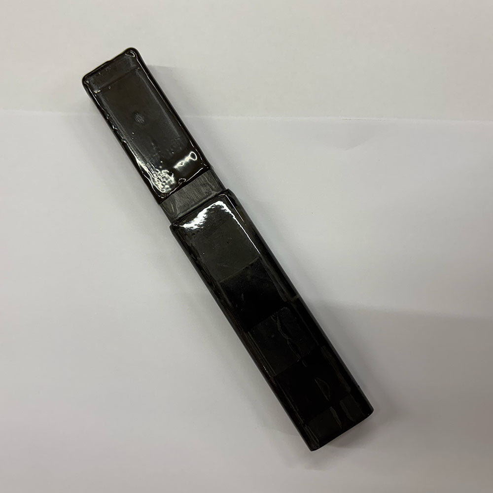 4 Inch, 10 cm black carbon stick extension with glue on it. It goes into the top shaft of the hockeystick to extend it.