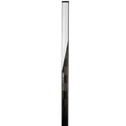 Top shaft detail of the NSC hockey stick showing the Dual D shaft shape and carbon finish.