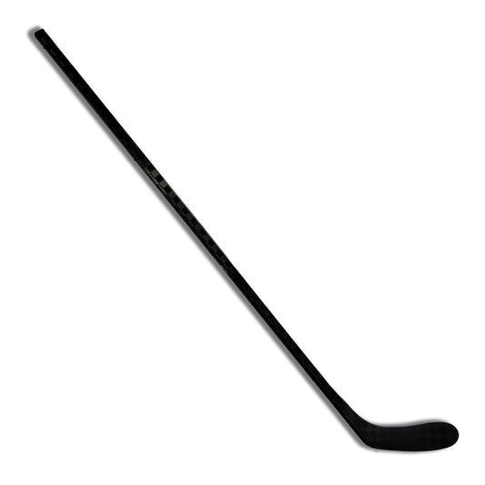 All black 100% high quality carbon icehockey stick. View of full stick diagonally displayed with shadow and white background. Forehand side of the blade is shown. Stick in Stock and in 2-3 days delivered.