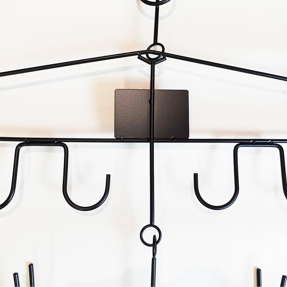 black steel frame middle part of ice hockey equipment hanger