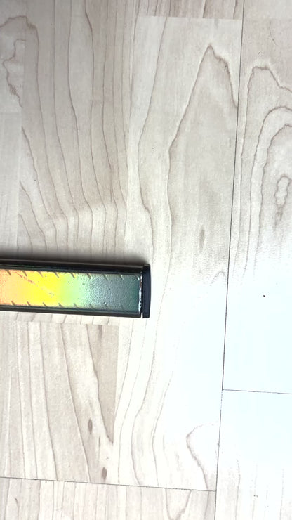 Video of Lunar 1.0 ice hockey stick, Lunar 1.0 Eishockeystock, Top Modell filmed from above, you can see the rainbow holo design mirroring the camera and close up spiral grip. filmed from top to bottom.